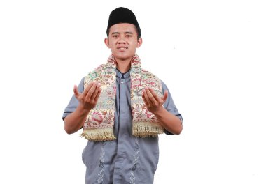 Happy Asian Muslim man gesturing welcome Ramadan isolated white clipart