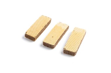 Beyaz arka planda izole edilmiş bir çift çikolatalı gofret kalın çikolata aromalı çıtır gofretler.