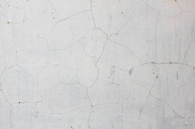 Beyaz duvar depreme bağlı çizgilerle dolu.