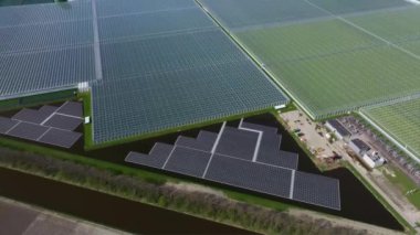 Arkasında Hollanda cam evleri olan geniş yeşil alan, canlı tarım manzarası sergiliyor