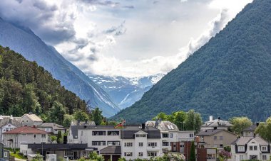 Andalsnes, Norway. Beautiful views of mountains, colorful cities and cruise ships in the arctic circle of Norway clipart