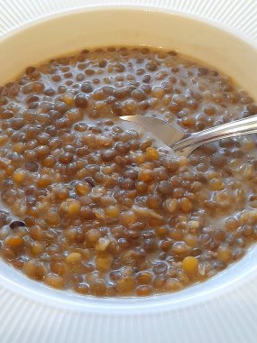 Arkaplan için kaşık ile mercimek yahnisi