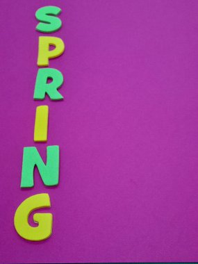 Spring text or subtitle with purple background. clipart