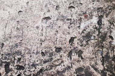 Küçük deliklerin görünümüne sahip yol betonu dokusu