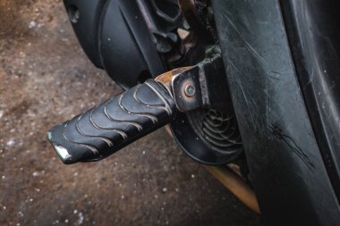 Close up portrait of old foot pegs motorcycle clipart