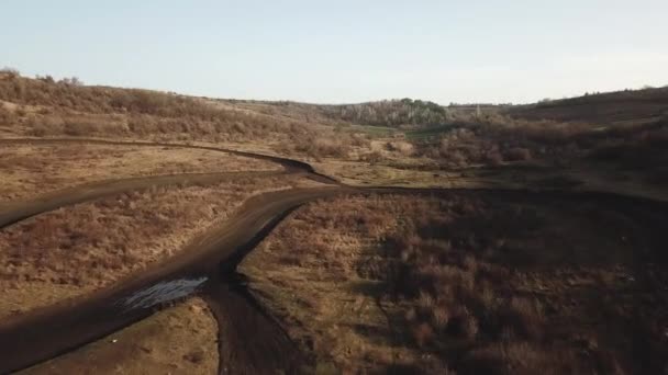Aerial View Rally Roads Dry Field Hills Winter Time Filming — Stock video