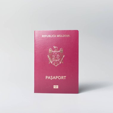 Close-up of Moldavian passport isolated on white background.