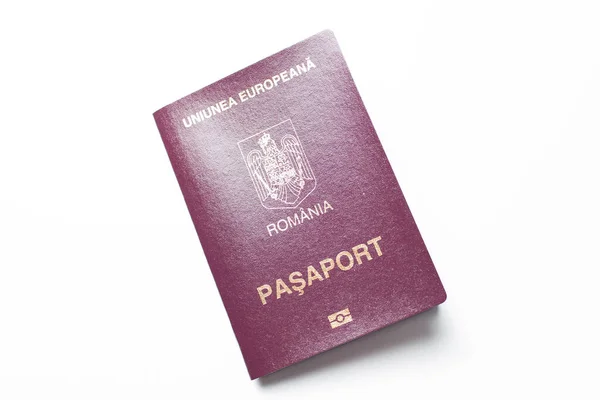 Close-up of Romanian passport isolated on white background.