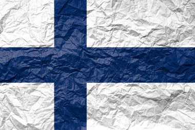 Buruşmuş kağıt üzerinde Finlandiya bayrağı. Desenli arkaplan.