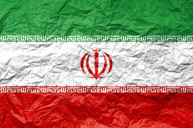 Kırışmış kağıt üzerinde İran bayrağı. Desenli arkaplan.