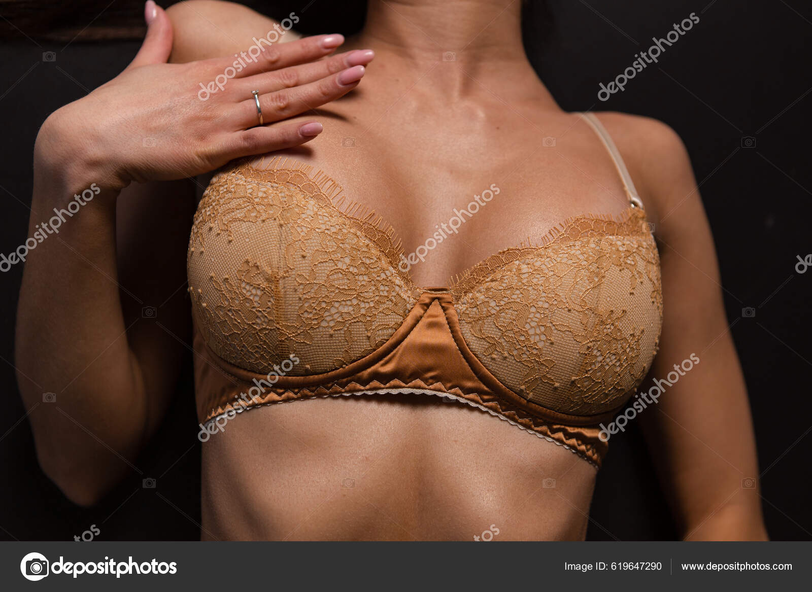 Beautiful Woman's Tanned Athletic Body Lingerie Stock Photo by