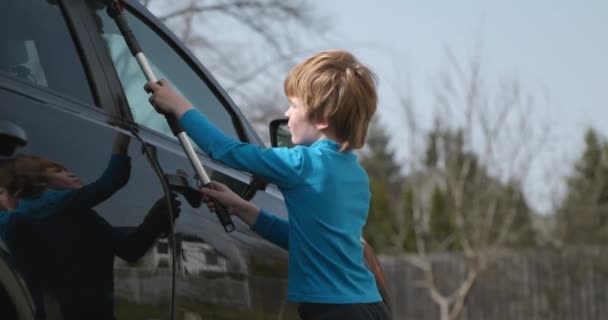 Child Wash Car Backyard Kid Boy Helps Cleaning Vehicle Slow — Stock Video