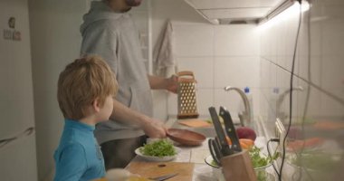 Boy Helps To Cook. Kid Prepare Food in Kitchen 4K 10-bit
