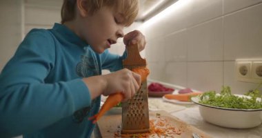 Boy Helps To Cook. Kid Prepare Food in Kitchen 4K 10-bit