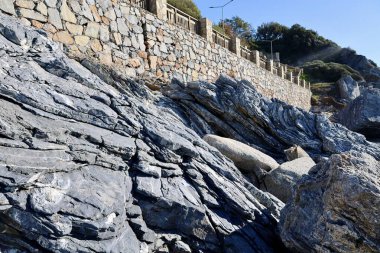 Rocky coastal wall. High quality photo clipart