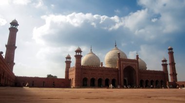 Beautiful view of Badshahi Mosque with cloudy sky in background clipart