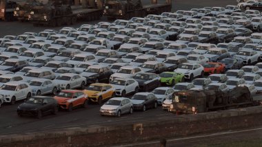 Emden, Germany - 02 04 2023: Parking place with brand new vehicles on the territory of the car factory of the biggest german car manufacturer
