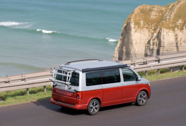 Modern Made In Germany Family MPV Van Bus Driving Along The Scenic East Atlantic Coast clipart