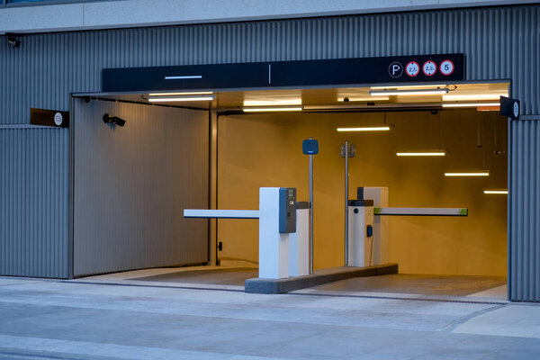 Modern Underground Parking Entrance with Automated Barrier System