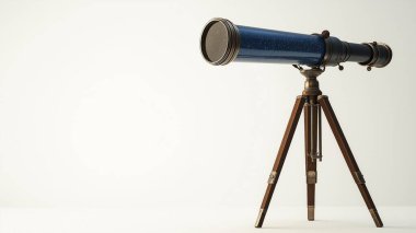 telescope with tripod on grey background. space for text.