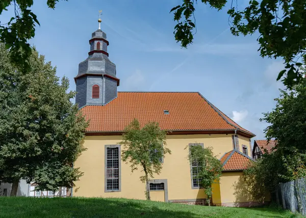 catholic church in germany, close-up of the chapel with the clock on the tower. High quality photo