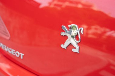 Tarragona, Spain - October 29, 2022: Peugeot logo on a car close-up. clipart