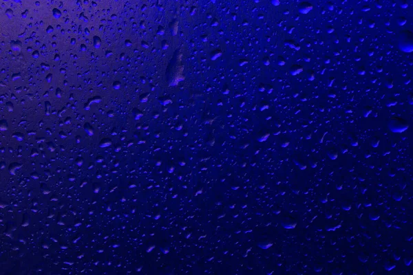 要旨青い背景に水滴の背景 — ストック写真
