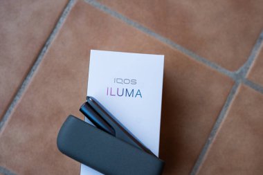 Tarragona, Spain - January 26, 2023: Phillip Morris Internationals Marlboro IQOS, electronic cigarette. Box new iluma.