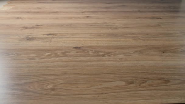 Spilled White Milk Wooden Laminate Parquet Floor Moisture Protection — ストック動画