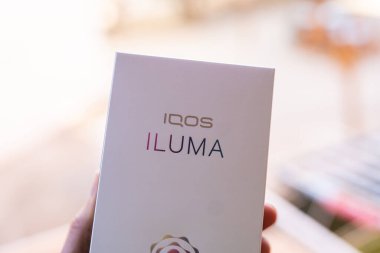 Tarragona, Spain - January 26, 2023: Phillip Morris Internationals Marlboro IQOS, electronic cigarette. Box new iluma.