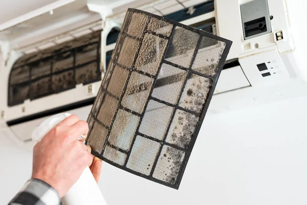 stock image Air conditioner filter dusty. Preparation for maintenance and cleaning.