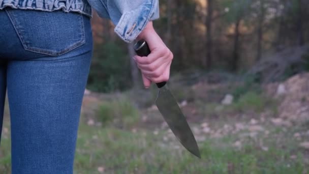 Girl Jeans Knife Her Hands Walks Forest — Stock Video