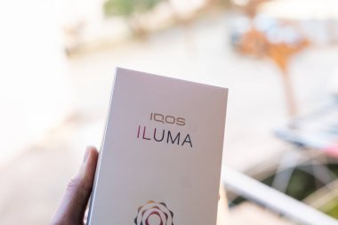 Tarragona, Spain - January 26, 2023: Phillip Morris Internationals Marlboro IQOS, electronic cigarette. Box new iluma.