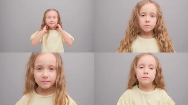 子供たちの幸せな笑顔のコラージュ 1つのビデオで彼女の顔に異なる感情を持つ女の子 — ストック動画