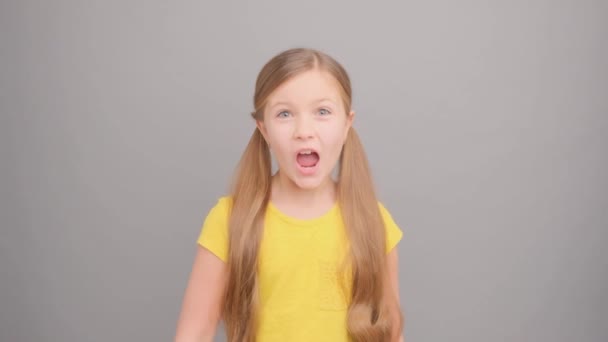Sign Gesture Teenage Girl Shows Finger Studio Gray Background — Stock Video