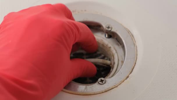Drain Plug Sink Clogged Mass Hair Dirt Plumber Rubber Glove — Stock Video