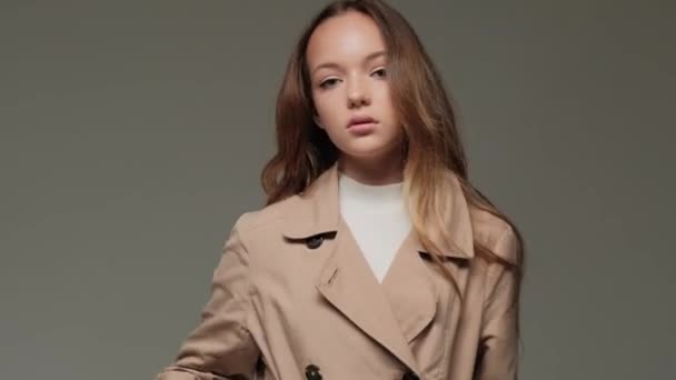 Stylish Fashionable Little Girl Trench Coat Studio Gray Background — Stock Video