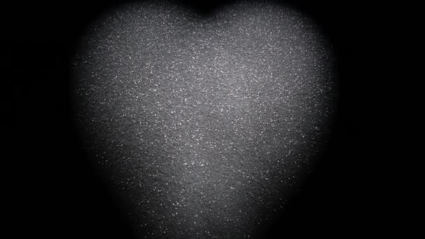 Hartvormige Textuur Van Glanzende Glitter Een Zwarte Achtergrond — Stockvideo