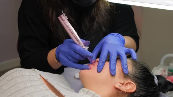 Young Woman Having Permanent Makeup Lips Beautician Salon Close — Stock Video