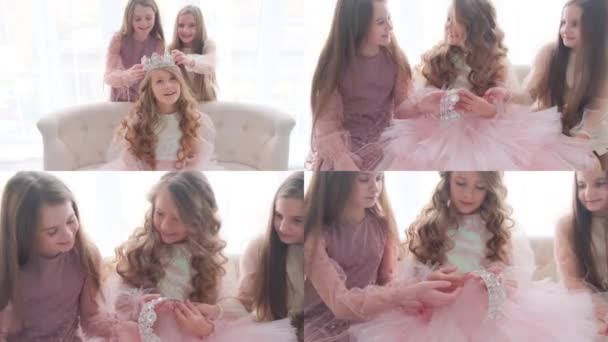 Three Girl Friends Sitting Sofa Looking Crown Princess Happy Children — Stock Video