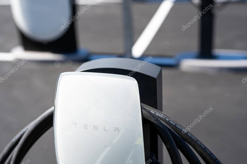 Tarragona, Spain - September 27, 2023: Electric car charging station Tesla Supercharger.