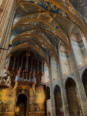 This is taken in the Saint Cecile Cathedral in Albi, South of France. This church was built in the 13th century and this photo displays the beckoning hall in which the grand organ is to be played.  clipart