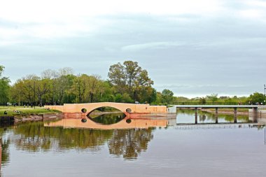 Tranquil Riverbank Retreat by Areco River clipart