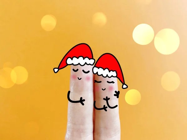 二本の指が二人として飾られている クリスマスを祝ってる — ストック写真