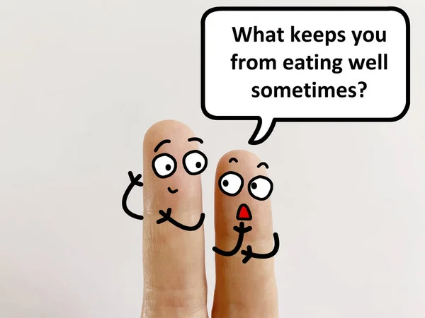 两个手指装饰成两个人 其中之一就是问另一个人是什么原因让他有时吃得不好 — 图库照片