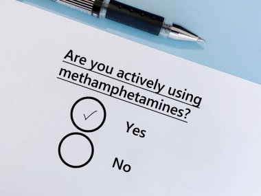 A person is answering question about substance use. He is actively using methamphetamines.