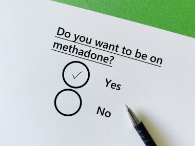One person is answering question about substance use. He wants to be on methadone.