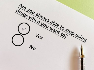 One person is answering question about substance use. He is always able to stop using drugs when he wants to.