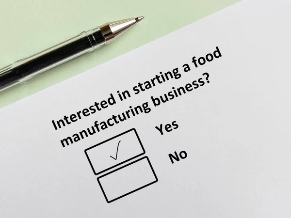 One person is answering question about food manufacturing. He is interested in starting a food manufacturing business.