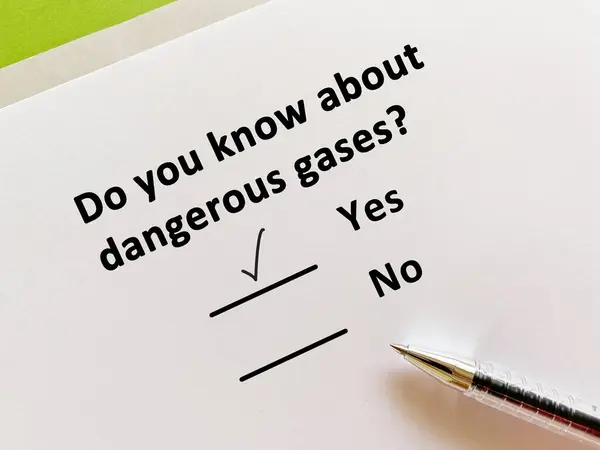 stock image A person is answering question about hazards. He knows about dangerous gases.